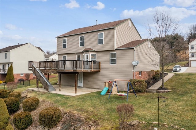 530 Peregrine Dr, North Huntingdon, PA 15642 - rear view of property featuring a playground, a wooden deck, stairs, a yard, and a patio