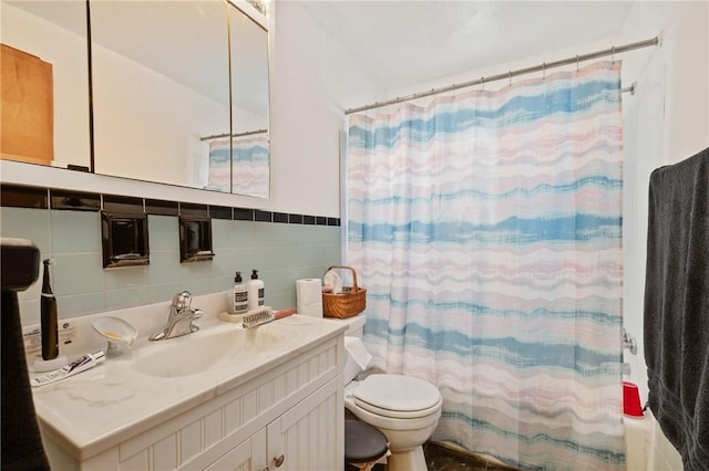 full bathroom featuring vanity, toilet, tile walls, and shower / bath combo with shower curtain