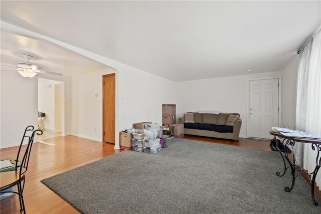 misc room with hardwood / wood-style flooring and ceiling fan