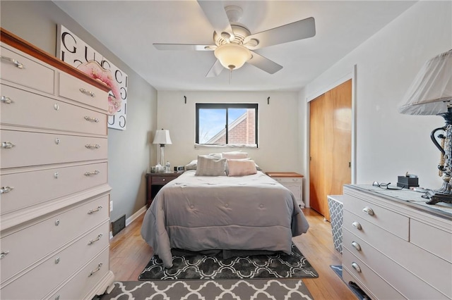 bedroom featuring ceiling fan and light wood-type flooring