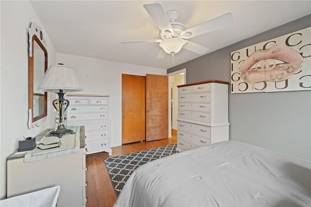 bedroom featuring ceiling fan and light wood-type flooring