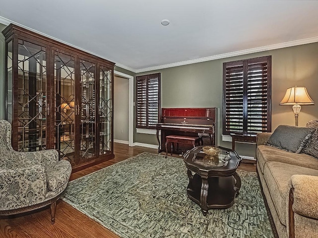 living room featuring dark wood-type flooring and ornamental molding