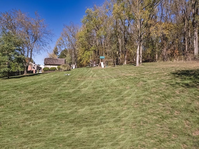 view of yard featuring a playground