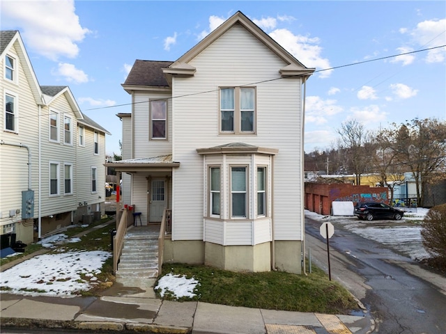 front of property featuring central AC unit