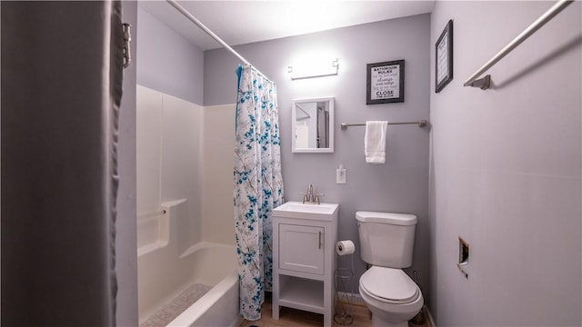 full bath with shower / tub combo, a sink, and toilet