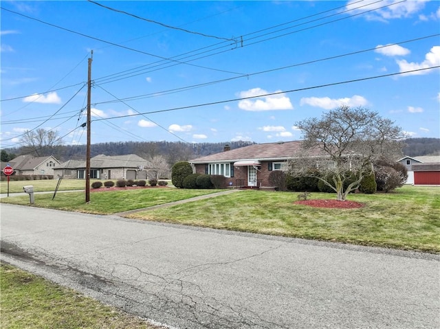 view of front of house with a front lawn