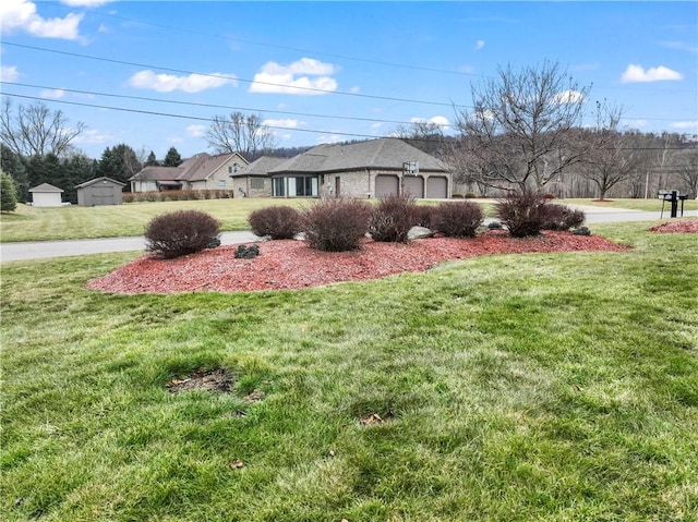 view of yard featuring a garage