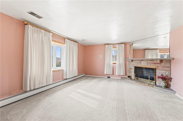 unfurnished living room featuring a baseboard radiator, a stone fireplace, and carpet floors