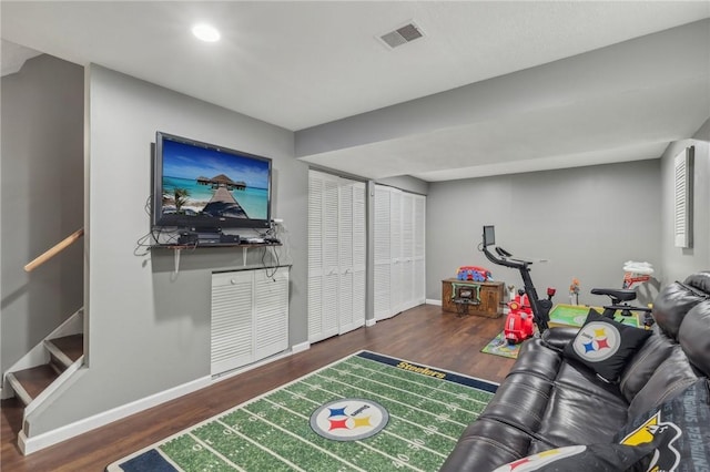 living room with dark wood-type flooring