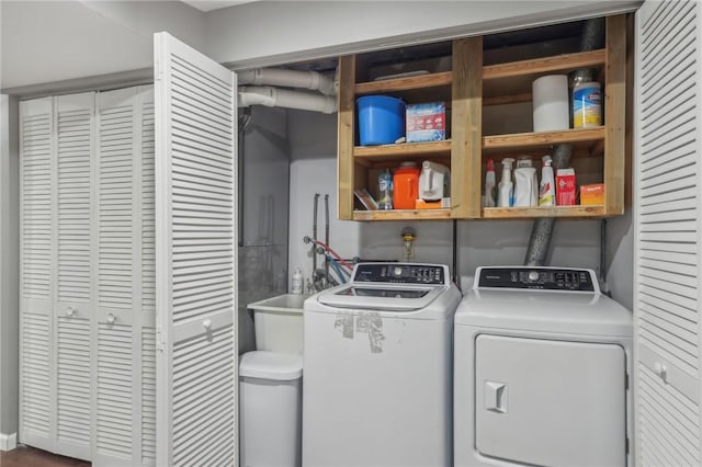 laundry area with washer and clothes dryer