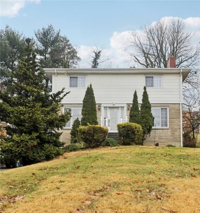 view of front facade with a front lawn