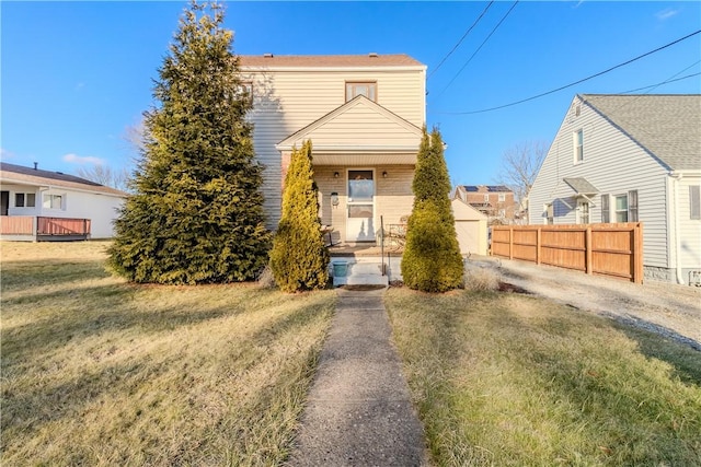 view of front of house with a front lawn