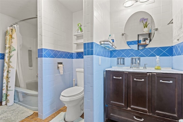 full bath featuring shower / bathtub combination with curtain, toilet, tile walls, and vanity