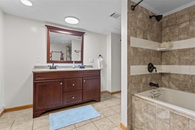 bathroom with tile patterned flooring, double vanity, visible vents, and a sink