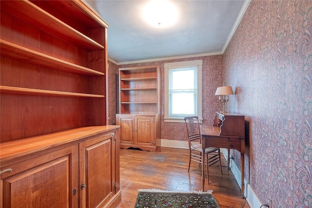 office area featuring crown molding and hardwood / wood-style flooring