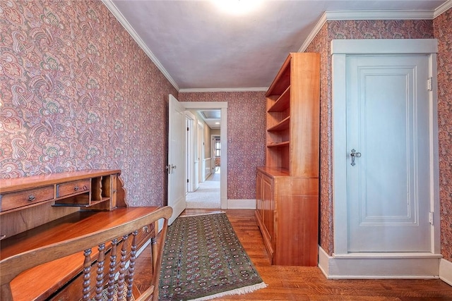 office area with ornamental molding and hardwood / wood-style floors