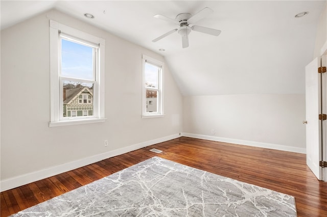 bonus room featuring ceiling fan, lofted ceiling, and hardwood / wood-style floors