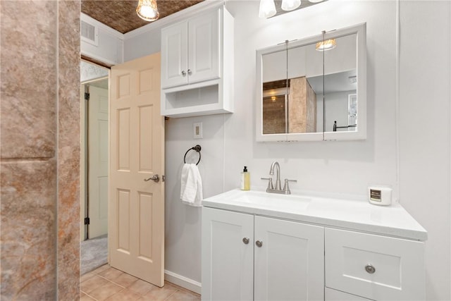 bathroom with vanity and tile patterned floors