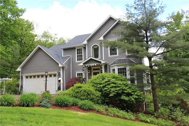 view of front of property featuring a garage