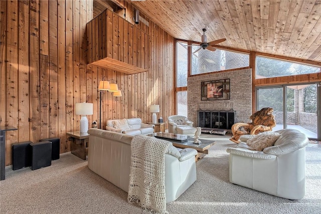 living room featuring high vaulted ceiling, carpet, a fireplace, wooden ceiling, and wood walls