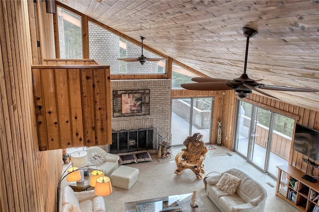 carpeted living room with a fireplace, a wealth of natural light, vaulted ceiling, and wooden ceiling