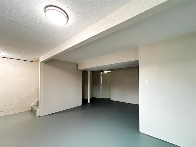 basement with a textured ceiling