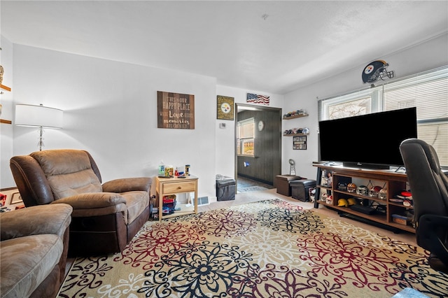 living room with light colored carpet