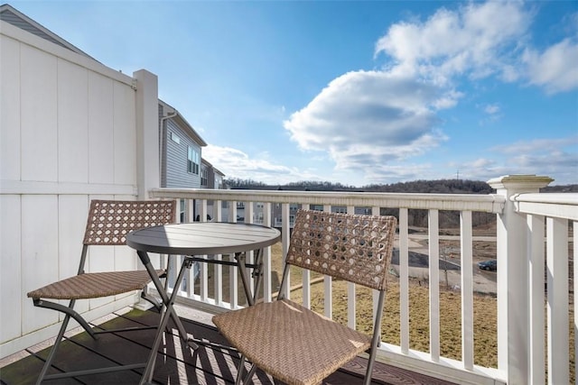 wooden balcony featuring a wooden deck