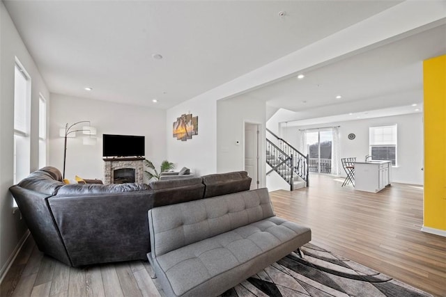 living room with light hardwood / wood-style floors