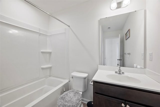 full bathroom with washtub / shower combination, vanity, and toilet