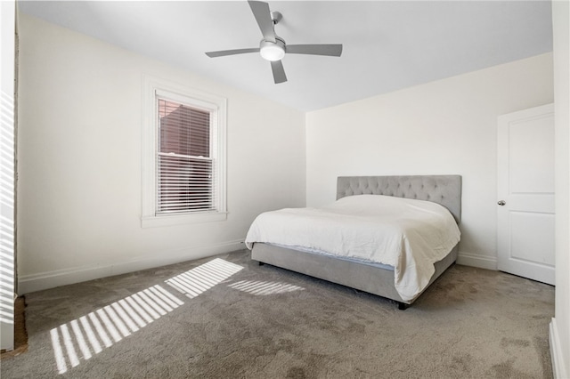 bedroom with ceiling fan and carpet flooring