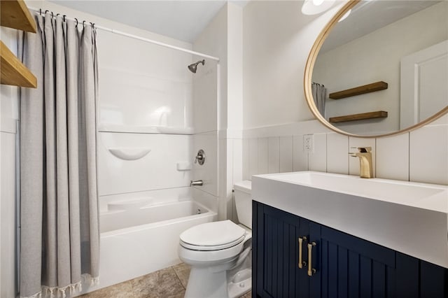 full bathroom featuring shower / tub combo, vanity, tile patterned floors, and toilet