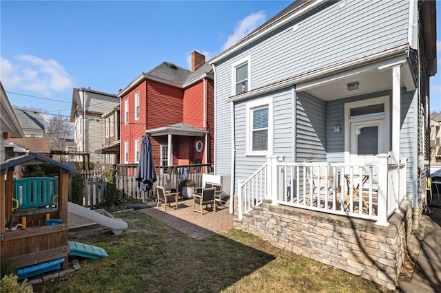 back of property with a patio area