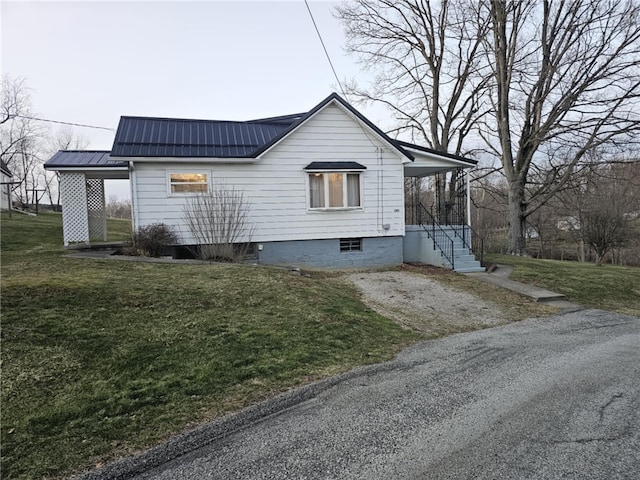 view of property exterior featuring a yard