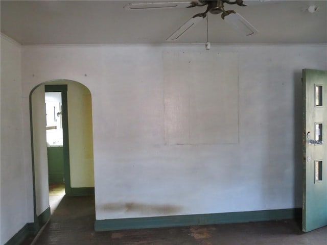 unfurnished room featuring ornamental molding and ceiling fan