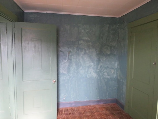 spare room featuring ornamental molding