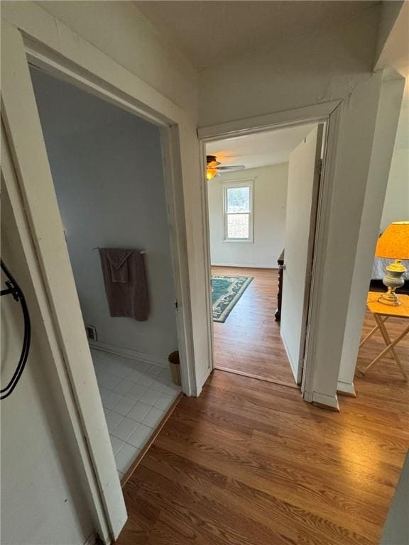 corridor featuring hardwood / wood-style flooring