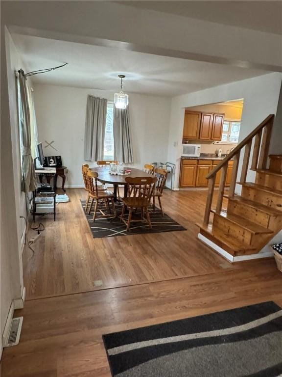 dining area with light wood-type flooring