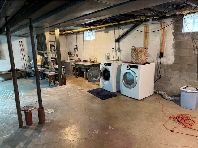 basement featuring washer and clothes dryer