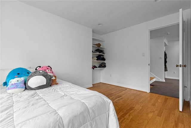 bedroom featuring hardwood / wood-style flooring