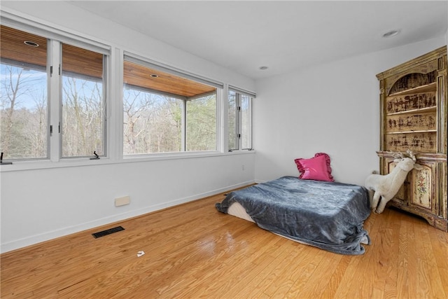 bedroom featuring wood-type flooring