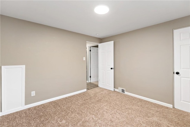 unfurnished bedroom with carpet