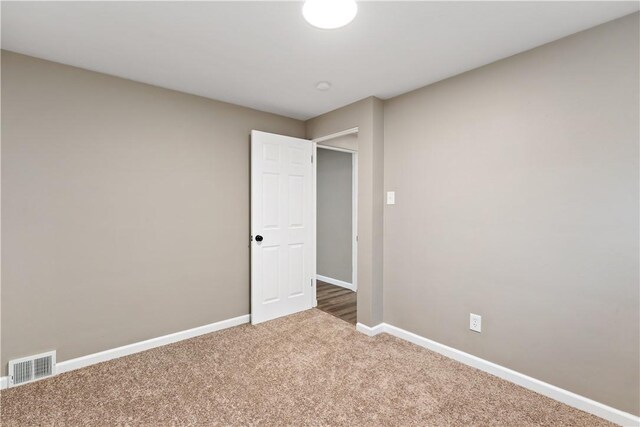 view of carpeted spare room