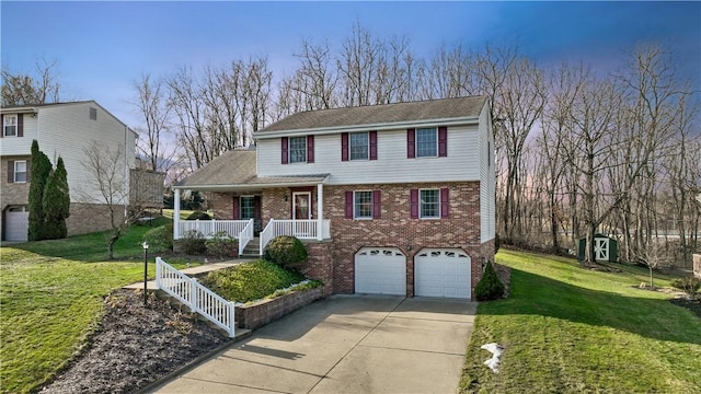 view of front property with a porch, a garage, and a front lawn