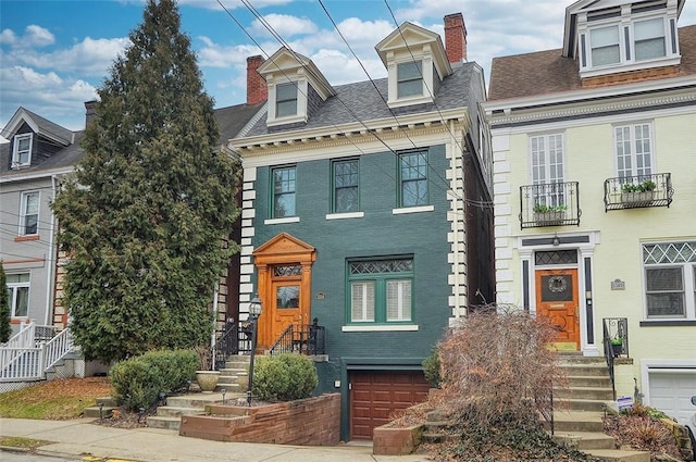 view of front of property featuring a garage