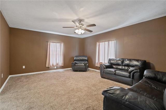 living room featuring carpet floors and ceiling fan