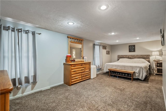 carpeted bedroom with a textured ceiling