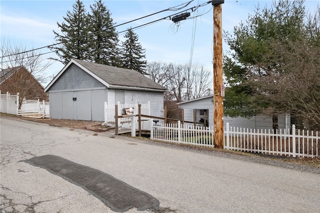 view of front of home with an outbuilding