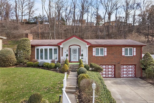 view of front facade featuring a garage and a front lawn