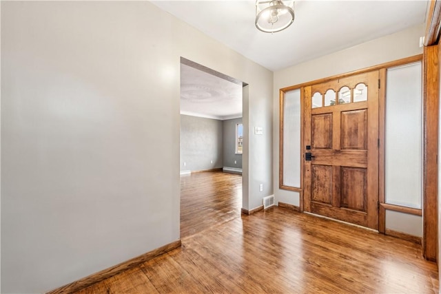 entryway featuring wood-type flooring